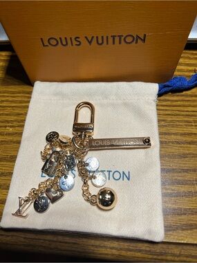 Louis Vuitton Gold-Tone Charm Key Holder with Signature Bar
